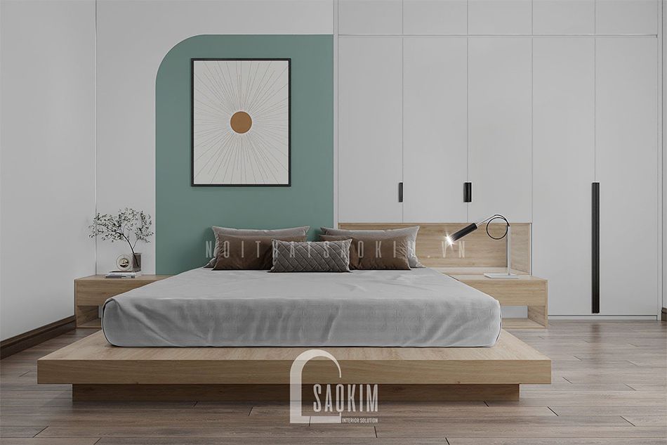 Thiết kế nội thất phòng ngủ master chung cư Royal City với gam màu chủ đạo trắng, gỗ sáng và điểm nhấn màu xanh lá